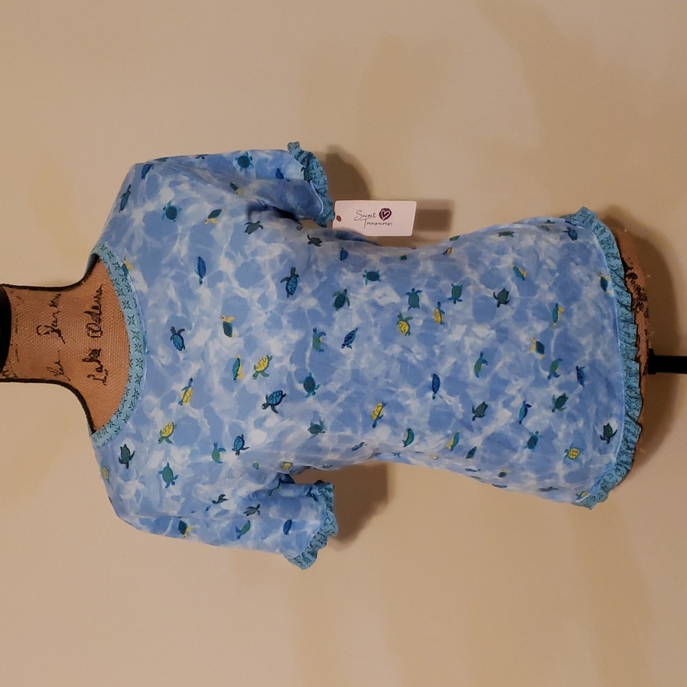 Brand New silky soft turtle top.